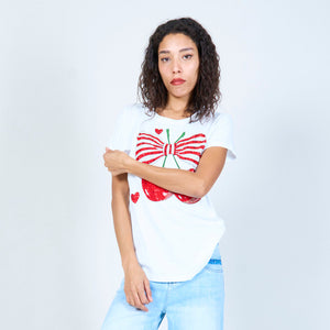 Playful cherry and bow graphic t-shirt in white