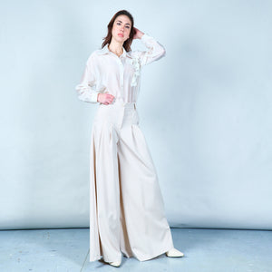 Pleated wide-leg trousers in Beige