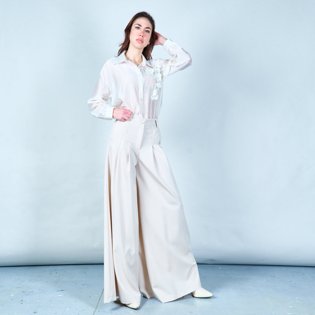 Pleated wide-leg trousers in Beige