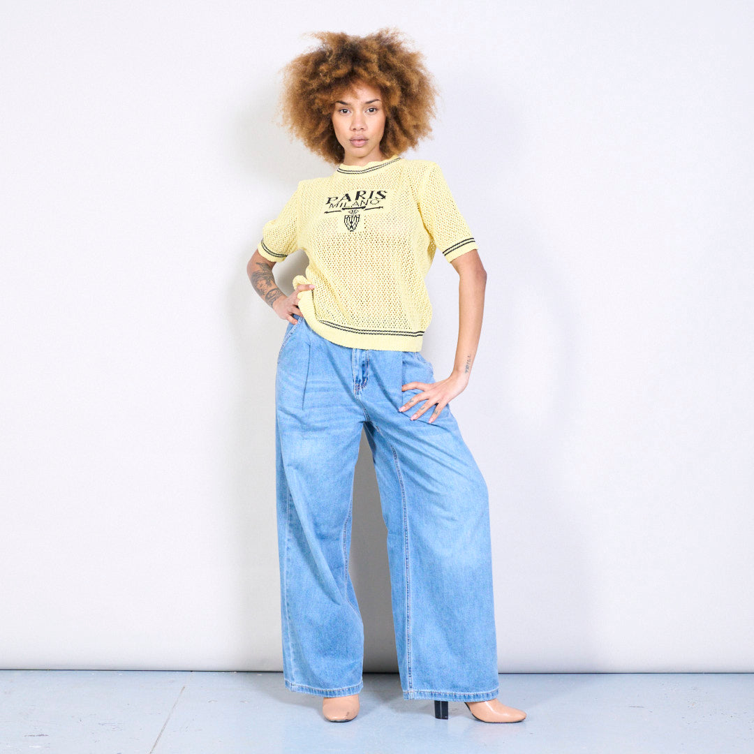 Textured knit top with lettering in yellow