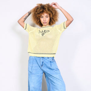 Textured knit top with lettering in yellow