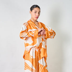 Abstract wave button-down blouse with wide-leg pants