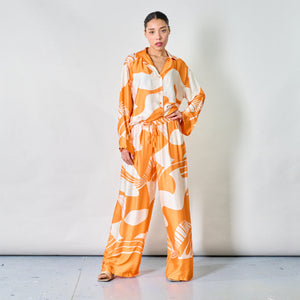Abstract wave button-down blouse with wide-leg pants