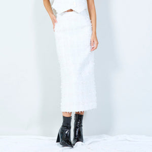 Elegant sleeveless vest with Stylish midi skirt in white