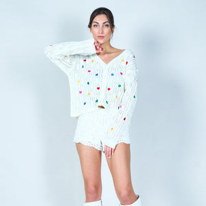 Open-knit cardigan with heart accents