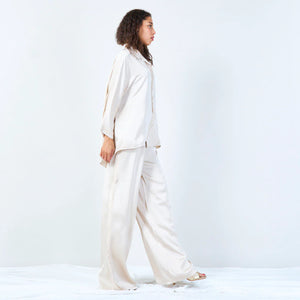 Frayed wide-leg trousers with drawstring in beige